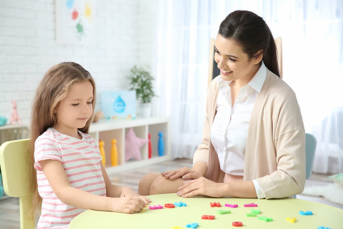  Woman Teacher and Little Girl on Private Lesson